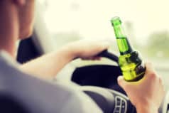 person drinking and driving