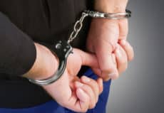 man in handcuffs for morphine possession