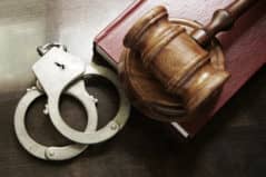 Handcuffs and gavel representing the NJ penal code's laws for extradition