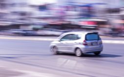 person recklessly driving at high speed on a highway