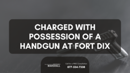 charged with possession of a handgun at Fort Dix